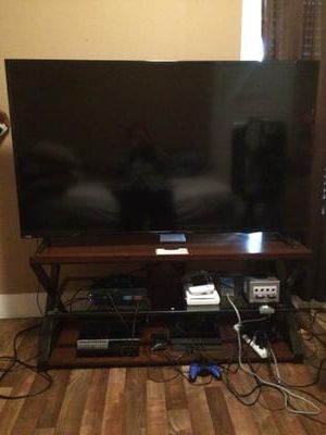 Favorite Jaxon 65 Inch Tv Stands Pertaining To Jaxon 3 In 1 Cognac Tv Stand For Tvs Up To 70" – Walmart (View 2 of 20)