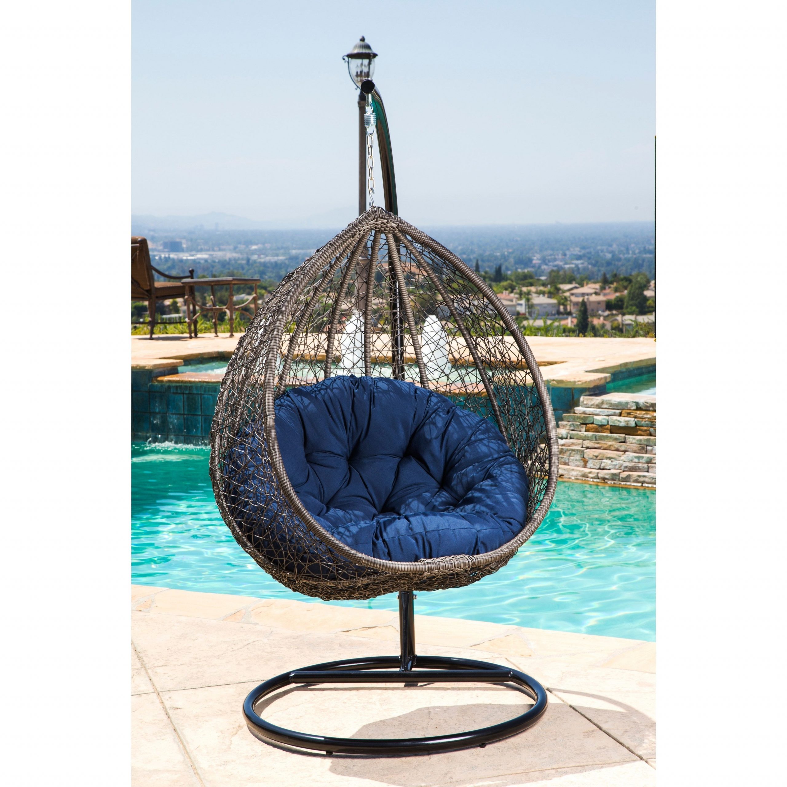 Abbyson Newport Outdoor Wicker Patio Swing Chair (brown/blue Pertaining To Best And Newest Outdoor Wicker Plastic Tear Porch Swings With Stand (View 24 of 30)