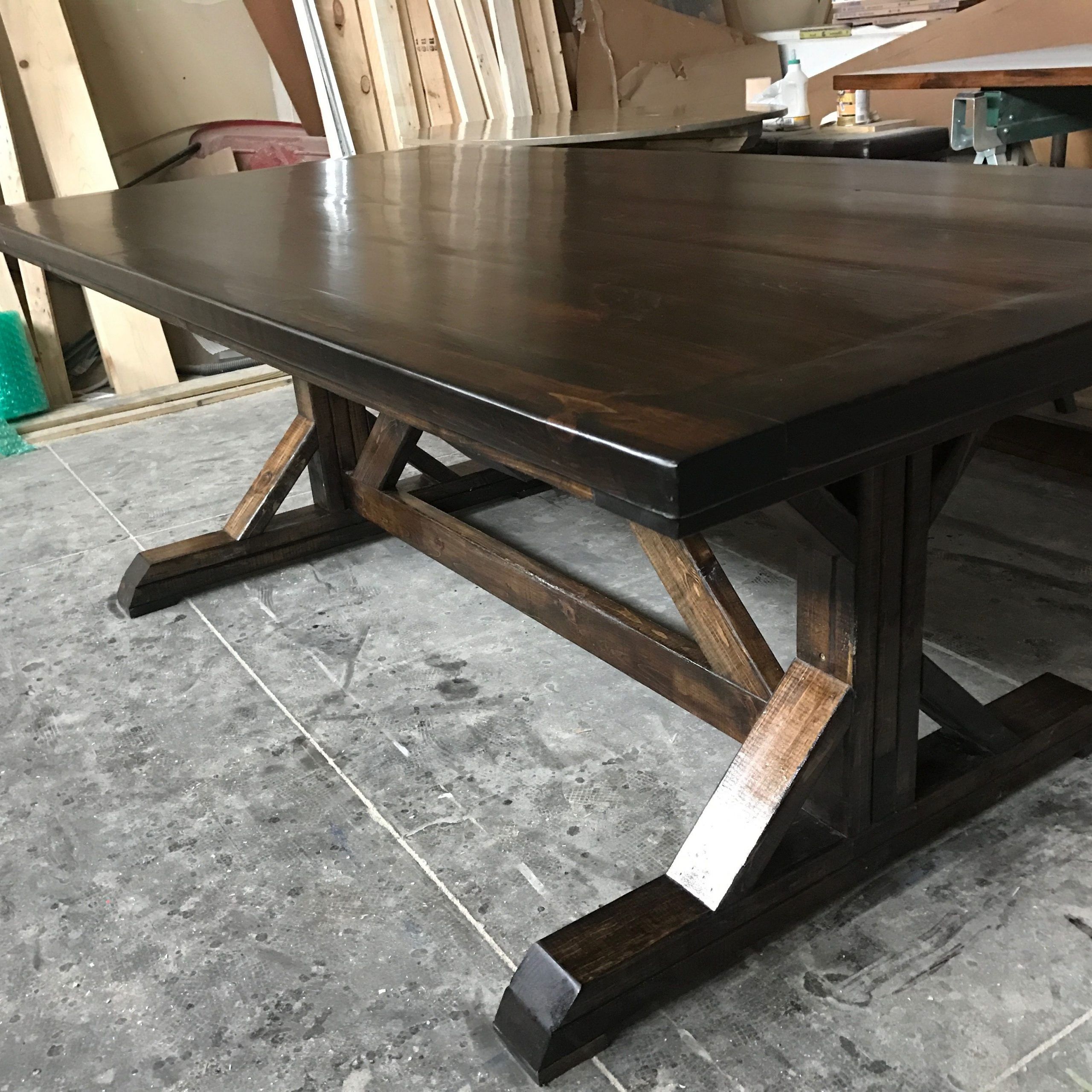 Thick White Marble Slab Dining Tables With Weathered Grey Finish For Latest Farm Trestle Table Done In Dark Browns With A Satin Finish (Photo 7 of 30)