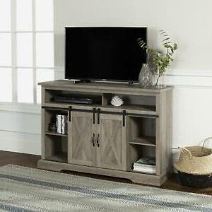 Manor Park Farmhouse Barn Door Tv Stand For Tvs Up To 58 Throughout Best And Newest Jace Tv Stands For Tvs Up To 58" (View 1 of 30)