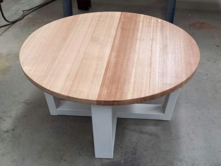 Most Recent Tassie Oak Round Coffee Table With White Steel Leg (View 7 of 10)