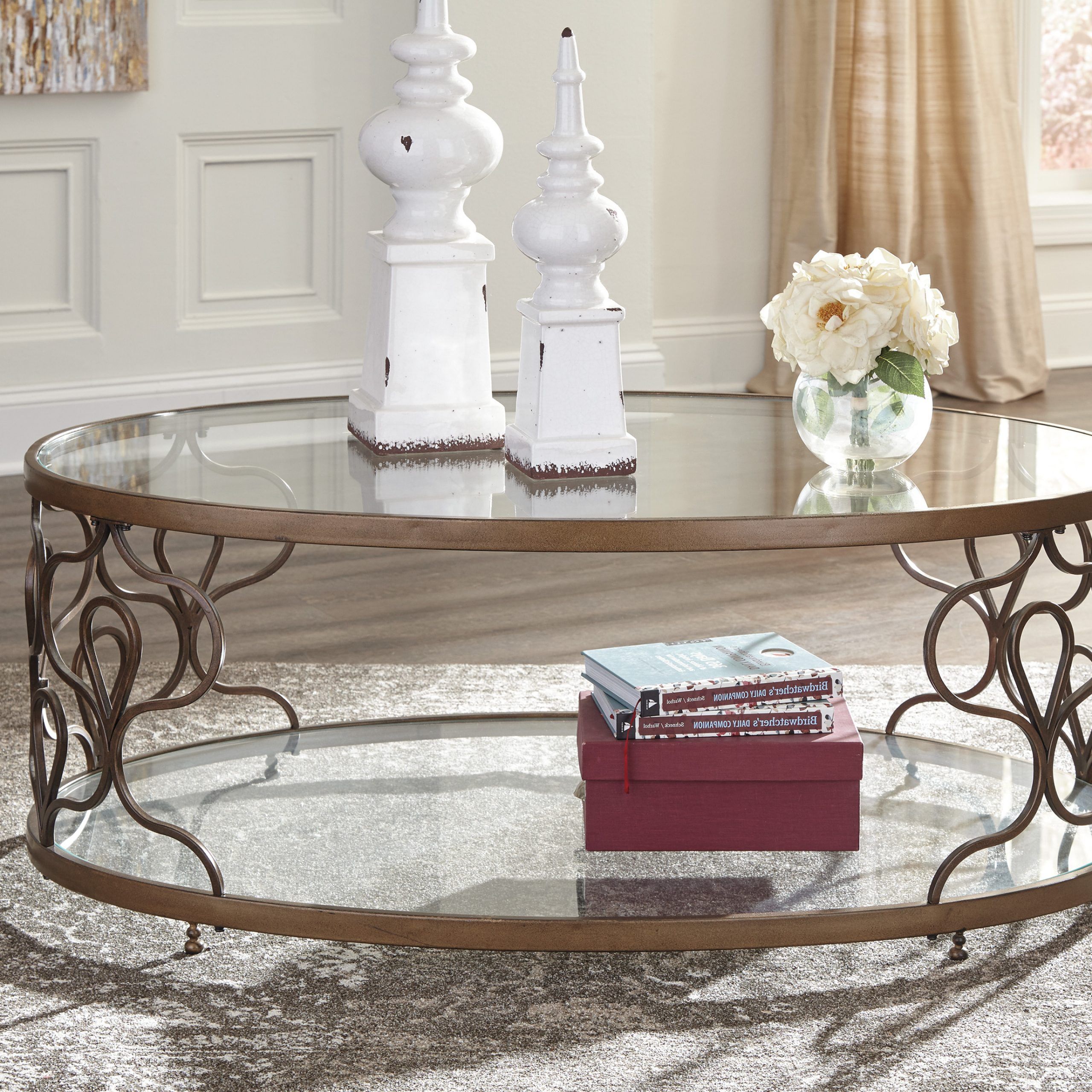 Ashley Furniture Fraloni Bronze Finish Oval Metal Coffee Table With Inside Trendy Espresso Wood And Glass Top Coffee Tables (View 7 of 10)