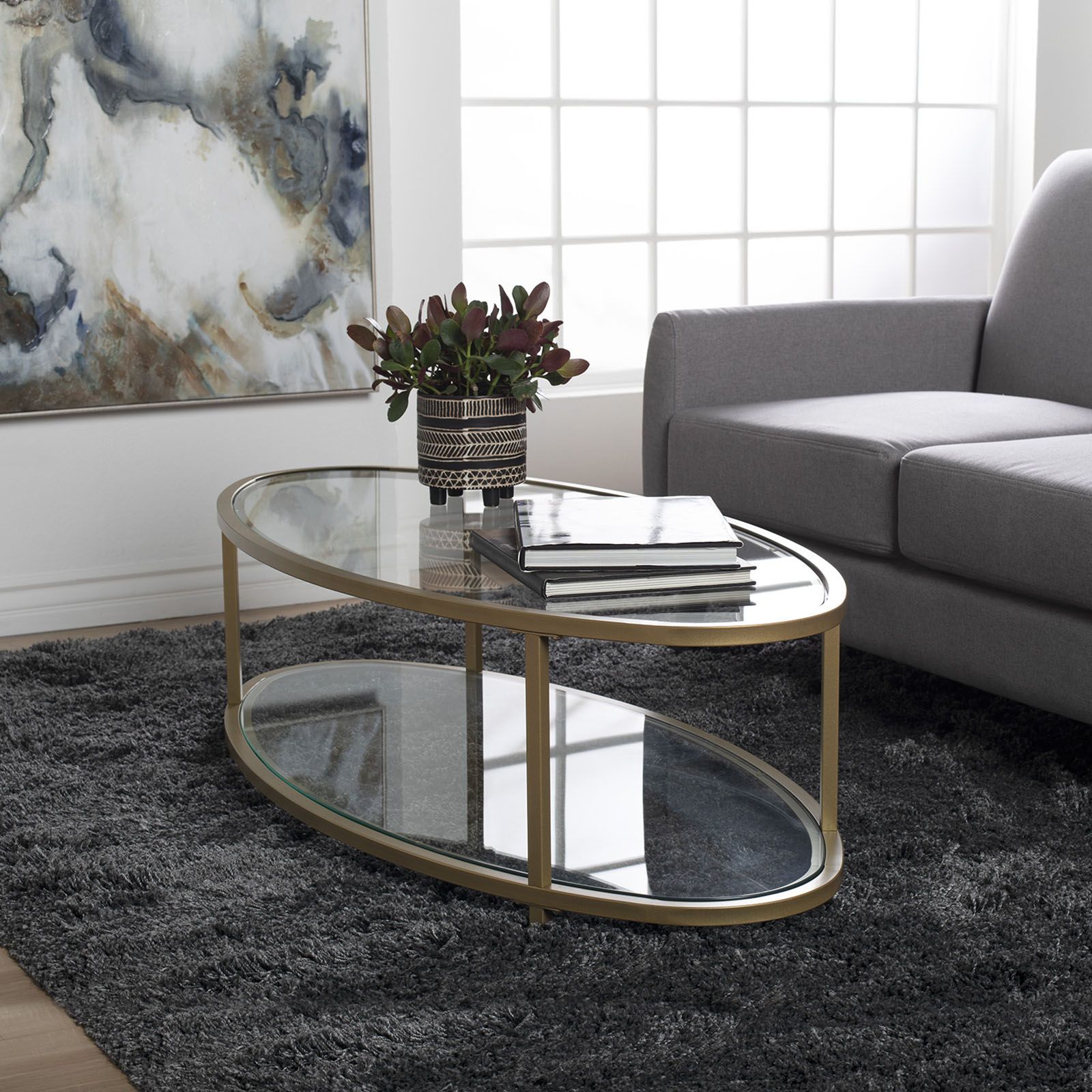Camber Modern Oval Coffee Table (48″ W) In Gold/clear Glass – Item Within Favorite Glass And Pewter Oval Coffee Tables (View 2 of 10)