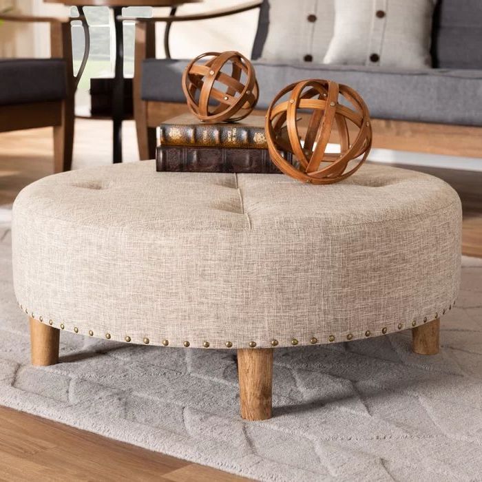 Fashionable Natural Solid Cylinder Pouf Ottomans Within Simoes Tufted Cocktail Ottoman (View 6 of 10)