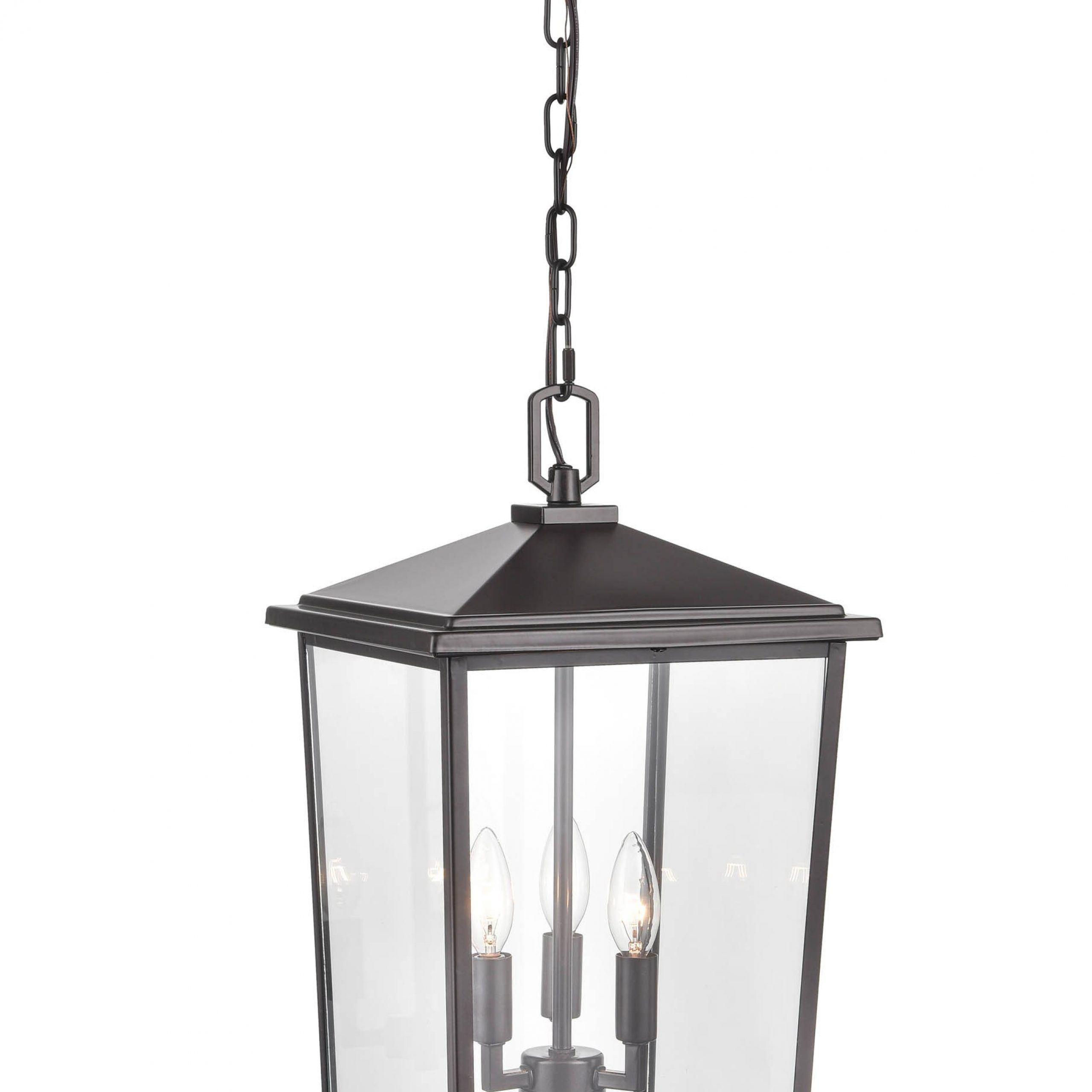 Millennium Lighting Fetterton 3 Light Powder Coat Bronze Transitional Clear  Glass Lantern Outdoor Pendant Light In The Pendant Lighting Department At  Lowes In Favorite White Powder Coat Lantern Chandeliers (View 5 of 10)
