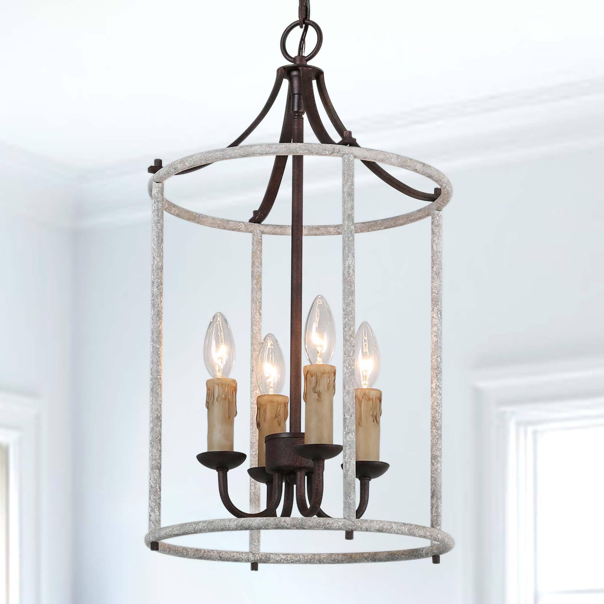 New World Decor Ribbon 4 Light Distressed Gray And Bronze Coastal Cage  Chandelier In The Chandeliers Department At Lowes With Fashionable Gray Wash Lantern Chandeliers (View 6 of 10)