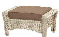 10 Collection of Black and Off-white Rattan Ottomans